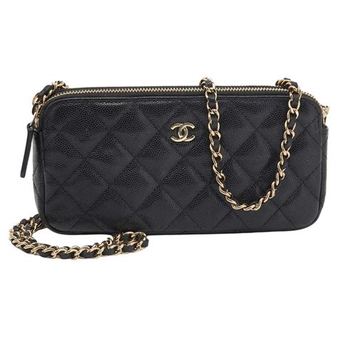 chanel black quilted wallet with white logo|Chanel wallet online store.